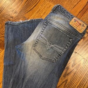 Men's Faded Blue Straight Jeans by True Religion - Classic Pocket Stitch